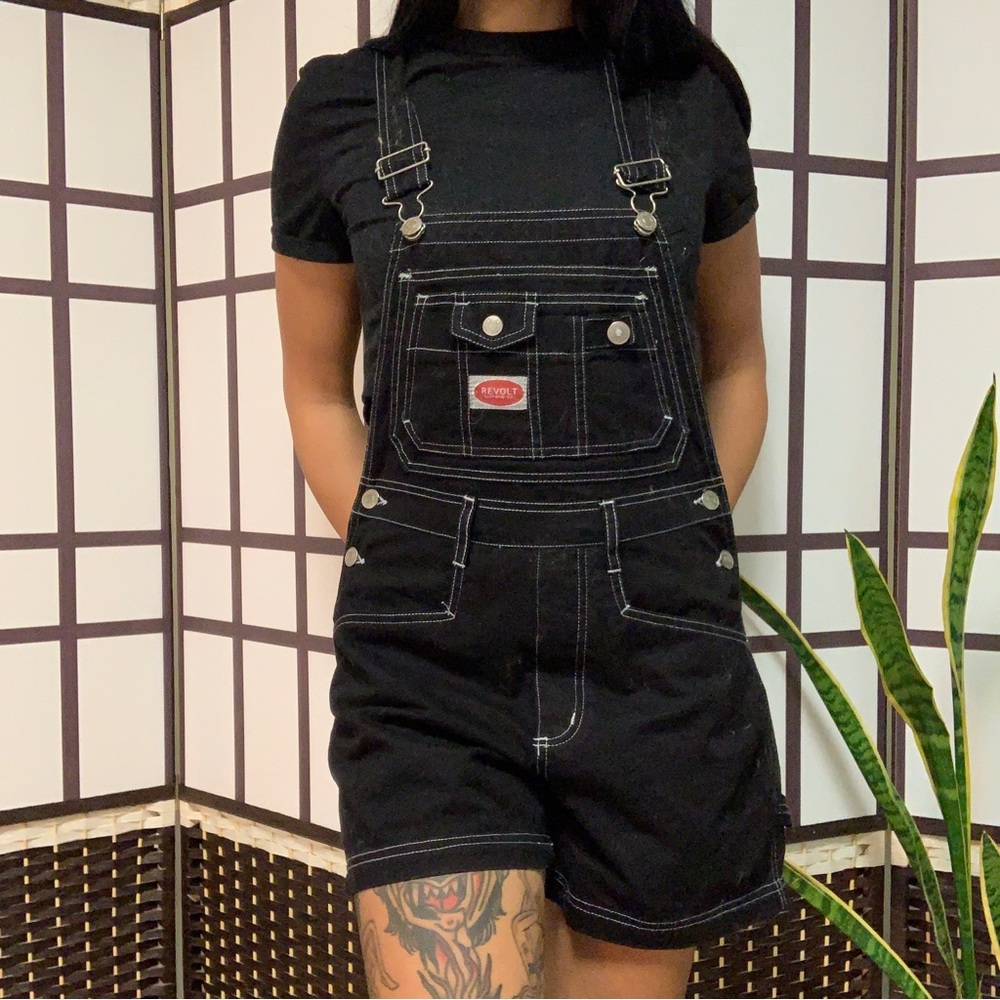 black overall shorts, size medium